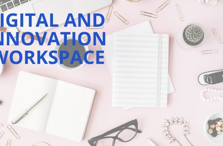 Workspace with notebooks, pens, and accessories on a pink surface. Text reads Digital Innovation Workspace in Iligan City.