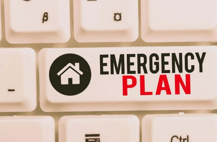 White keyboard with a key showing a house icon and text: Emergency Plan in black and red, ideal for Iligan City.