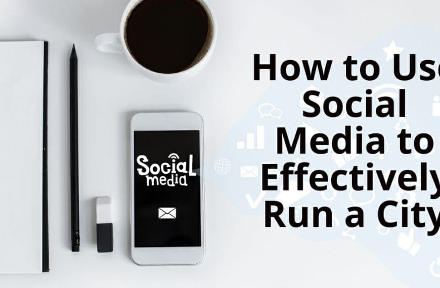 On a desk with coffee, notebook, pencil, and phone sits a text on How to Use Social Media to Run Iligan City Effectively.