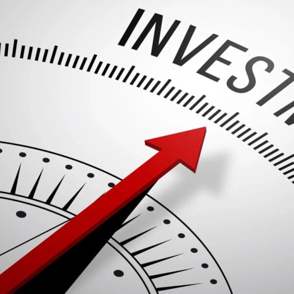 compass with red needle pointing at investment, hinting at iligan citys vibrant business frontier.