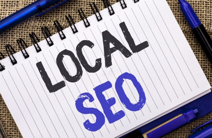 a notebook with local seo written on it, surrounded by pens, highlights localseo.ph on a burlap background.