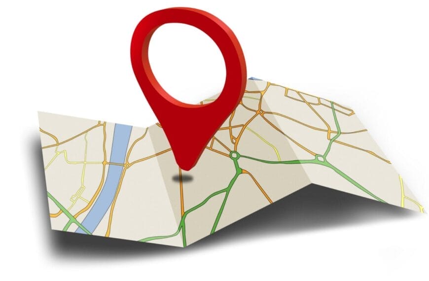 a folded map with a large red pin marks a spot, ideal for travel and tour operators in iligan city.
