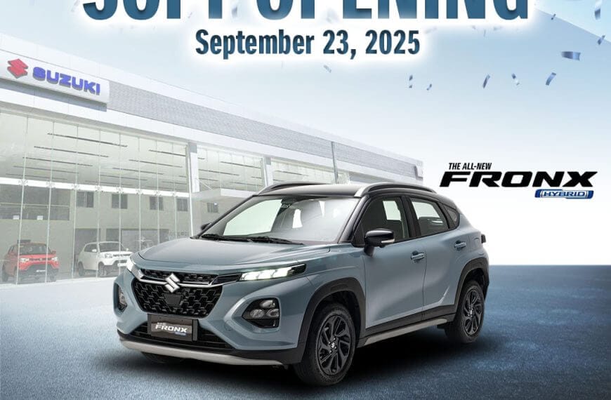a silver suzuki fronx is parked at suzuki auto iligan, with soft opening september 23, 2025 above.