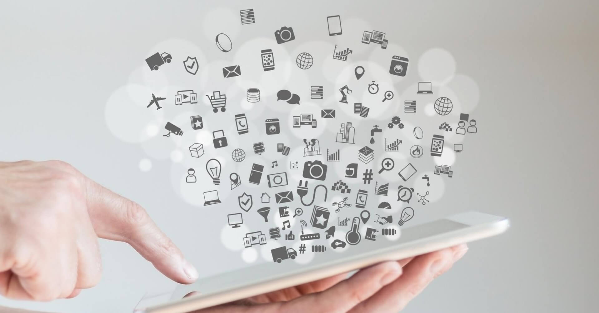 a hand touches a tablet as social icons float highlighting fast fiber internet iligan city connections