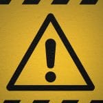 yellow warning sign with black exclamation mark, striped border—used for pagasa warnings or iligan weather alerts.