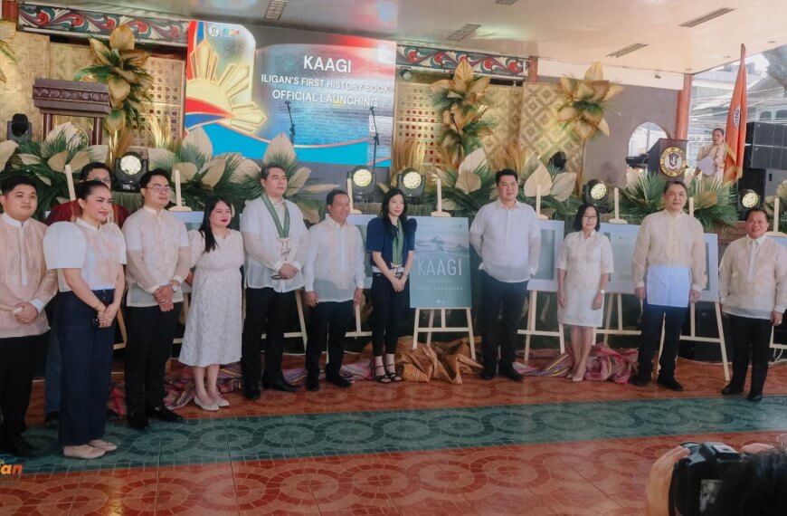 a group in formal attire poses on stage at the kaagi iligan history book launch in iligan city.