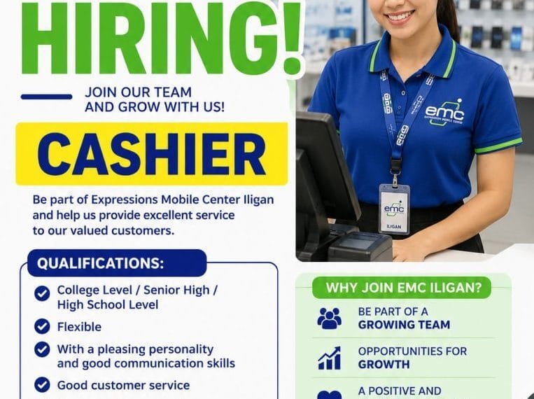 smiling woman in emc uniform stands at counter; expressions mobile center is hiring cashiers for iligan jobs.