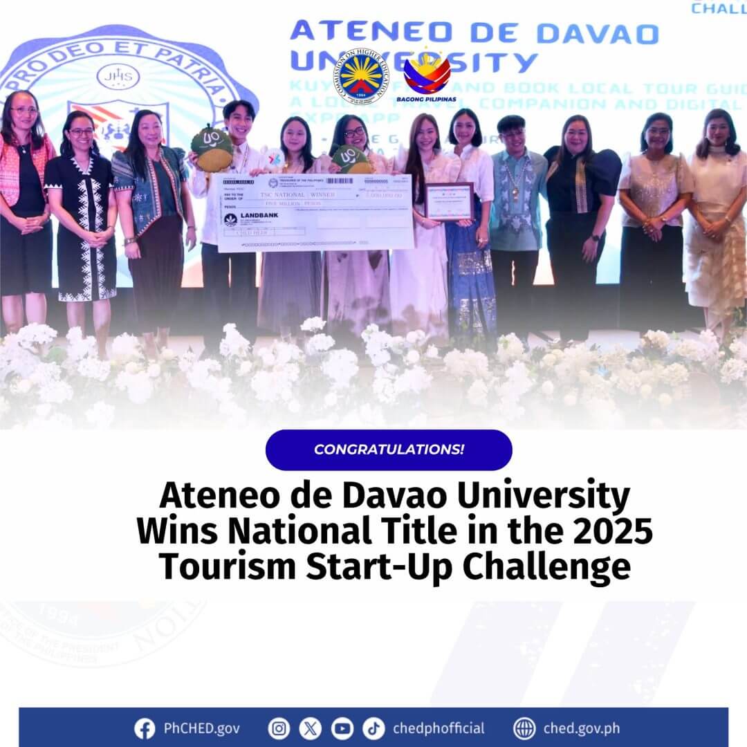 a group on stage with a trophy and large check, celebrating the 2025 tourism start up challenge at ateneo de davao university.