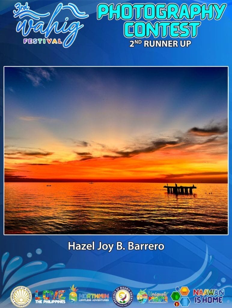 a vivid sunset over calm sea waters, capturing the essence of wahig festival for a photography contest.