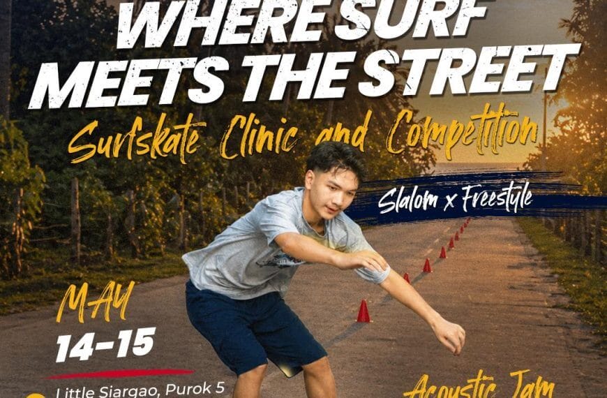 a young man skates at sunset during the surfskate clinic, with wahig festival logos in naawan misamis oriental.